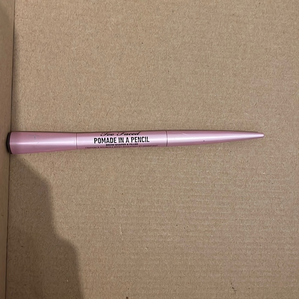 Too faced pomade in a pencil brow shaper and filler